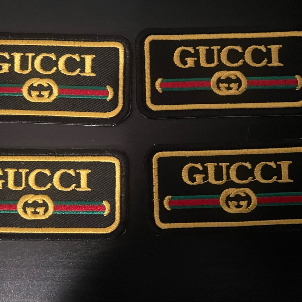 Gucci Black and Gold Logo Patches